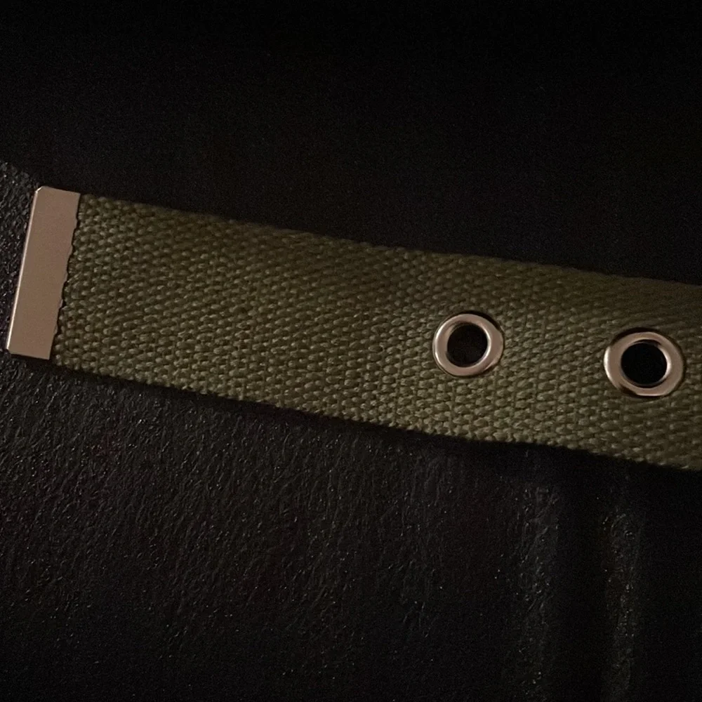 Women’s— green belt, with silver metal punch holes and silver buckle. - Picture 2 of 2